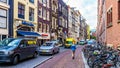 Bikes and parked cars in Amsterdam in the Netherlands