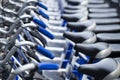 Bikes parking row for rent university. Royalty Free Stock Photo