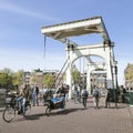 Bikes on skinny bridge in amsterdam centre