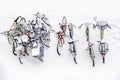 Bikes in the snow - bicycles background white winter above view Royalty Free Stock Photo