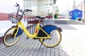 Bikesharing. Bicycles for rent. Bicycle in the bicycle parking near the store. Ecological urban transport