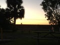 Biking across the Florida Everglades at sunset Royalty Free Stock Photo