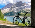 Biking on Fedaia lake and Pass, Marmolada dolomite alp, trentino Royalty Free Stock Photo