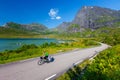 Biking in Norway against picturesque landscape. Bike, active