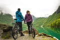 Biking in Norway against picturesque landscape