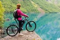 Biking in Norway against picturesque landscape