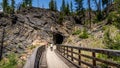 Biking over the Wooden Trestle Bridges of the abandoned Kettle Valley Railway in Myra Canyon