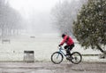 Biking in the park snow snowing