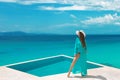 Bikini carefree woman in swimwear enjoying honeymoon, girl relax