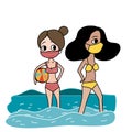 Bikini 2 friends in trikini face mask enjoy themselves on the beach in sunny day