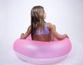 Bikini girl on a float on her back Royalty Free Stock Photo