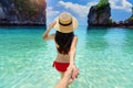 Bikini girl holding man`s hand and leading him to koh hong island in Krabi, Thailand Royalty Free Stock Photo