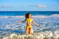 Bikini girl jumping in Caribbean sunset beach Royalty Free Stock Photo