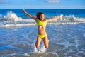 Bikini girl jumping in Caribbean sunset beach Royalty Free Stock Photo