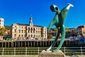 Bilbao Biscay Spain. Historical buildings and modern art statue by Nervion River Royalty Free Stock Photo