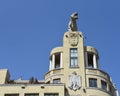 Bilbao, Spain - 22 April, 2022: The Tiger of Deusto, a sculpture by Joaquin Lucarini, sitting on top of a building in the city of