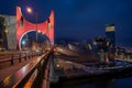 View of the Guggenheim museum, the Iberdrola tower and the red arches from the La Salve bridge in Bilbao at night Royalty Free Stock Photo