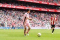BILBAO, SPAIN - ARPIL 3: Andres Fernandez of Granada CF and Aritz Aduriz in the match between Athletic Bilbao and Granada