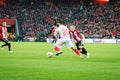 BILBAO, SPAIN - ARPIL 7: Iker Muniain and Vitolo Machin in the match between Athletic Bilbao and Sevilla in the UEFA Europa League