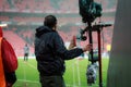 BILBAO, SPAIN - ARPIL 7: A television camera watching the rain on the football field before the match between Athletic Bilbao and