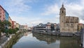 Exterior view at the NerviÃ³n river and Areatzako zubia bridge, Ribera Market and San Anton church, Bilbao downtown city, Spain Royalty Free Stock Photo