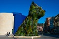 Puppy sculpture covered with flowers by the artist Jeff Koons