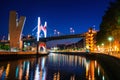 Illuminated Salbeko zubia Bridge over Nevion River in Bilbao, Spain at night