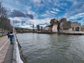 Bilbao, Spain march 27th 2024: Nervion river and Guggenheim Bilbao Museum, Bilbao, Spain Royalty Free Stock Photo