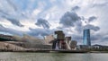 Bilbao, Spain march 27th 2024: Nervion river and Guggenheim Bilbao Museum, Bilbao, Spain Royalty Free Stock Photo