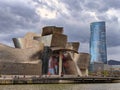 Bilbao, Spain march 27th 2024: Nervion river and Guggenheim Bilbao Museum, Bilbao, Spain Royalty Free Stock Photo