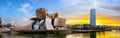 Bilbao, Spain - NOV 20, 2021: awesome evening panoramic view of The Guggenheim Museum designed by Frank Gehry and embankment Royalty Free Stock Photo