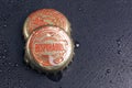 Bottle caps of Desperados beer. Royalty Free Stock Photo