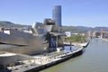 Bilbao, 13th april: Guggenheim Museum Building with Maman Spider Sculpture alongside Nervion River from Bilbao city in Spain