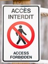 Bilingual access forbiden sign