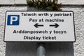 Bilingual street sign indicating pay and display zone Llandudno North Wales