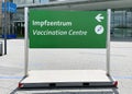 bilingual vaccination center sign in German and English