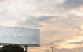 Billboard blank for outdoor advertising poster or a blank billboard at a twilight time for advertisement. Royalty Free Stock Photo