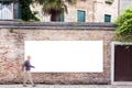 Billboard with copy space on the wall in Venice