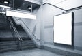 Billboard and direction signage mock up in subway with stairs Royalty Free Stock Photo