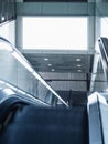 Billboard mocked up in subway station with escalator