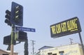 Billboard reading Ã¯Â¿Â½We can get alongÃ¯Â¿Â½, South Central Los Angeles, California