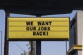 Billboard saying We Want Our Jobs Back! Anti-lockdown protests Royalty Free Stock Photo