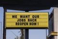 Billboard saying We Want Our Jobs Back Reopen Now! Anti-lockdown protests Royalty Free Stock Photo