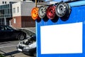 Billboard, small car center, service of cars and repair of disks on the street, wheels, the