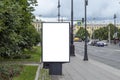 Billboard vertical, white isolate. on the background of the city