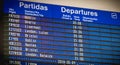 Billboards departing and arriving aircraft inside the international airport of Faro Royalty Free Stock Photo