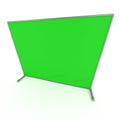 Billet press wall with green screen banner.