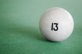 Billiard Ball number 13 on a pool table. A close-up image of an number thirteen ball on a pool table Royalty Free Stock Photo