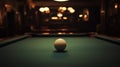 Billiard ball on pool table in dimly lit room Royalty Free Stock Photo