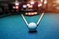 Billiard ball with two sticks on blue table Royalty Free Stock Photo